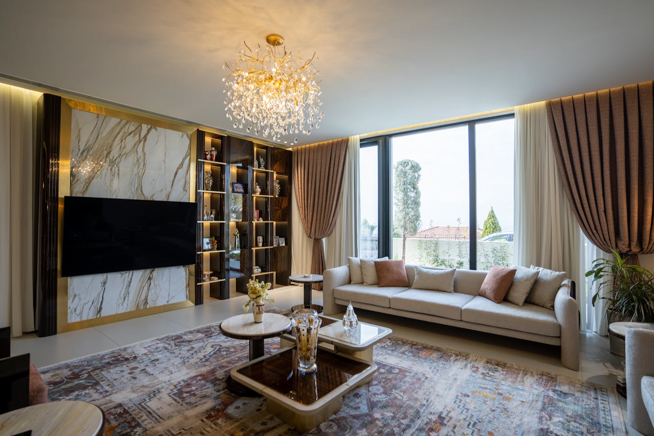 The Art of Drawing Readers In: Your attractive post title goes here Luxurious modern living room with chandelier and large windows in Sulaymaniyah, Kurdistan.